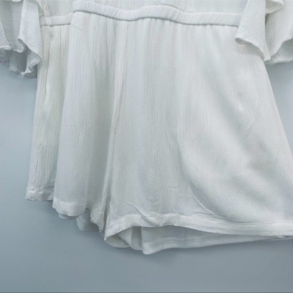 Lulu’s! White off shoulder all in one shorts romper! Flutter sleeves. - Picture 6 of 10
